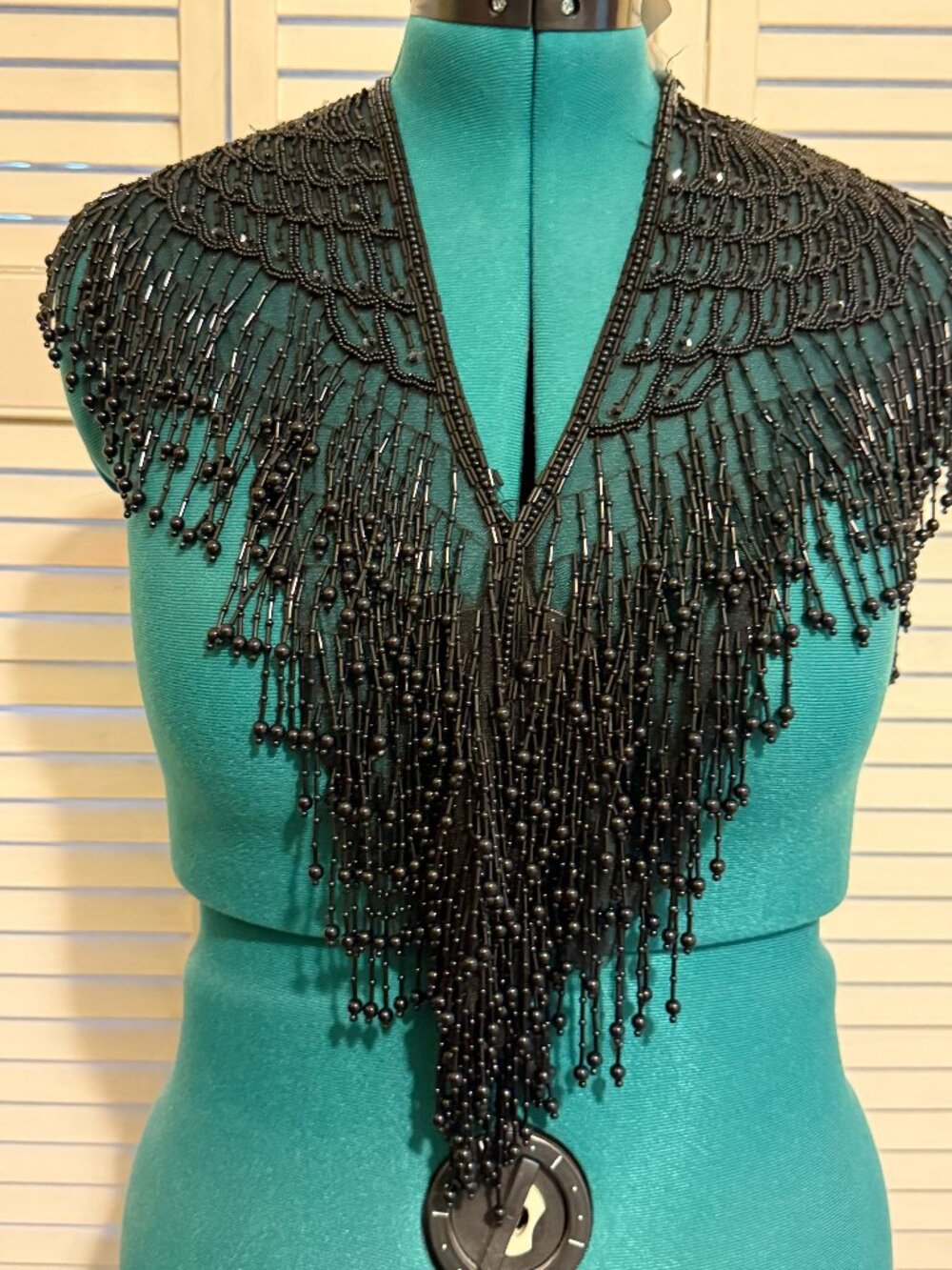 Beaded shoulder wrap